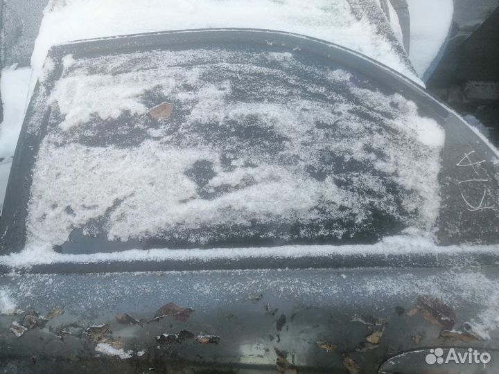 Стекло заднее Kia Spectra