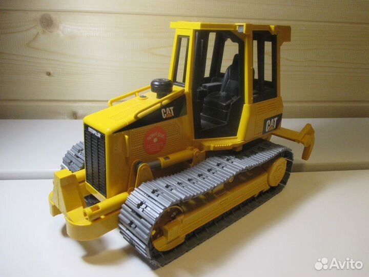Игрушка модель Бульдозер CAT caterpillar bruder