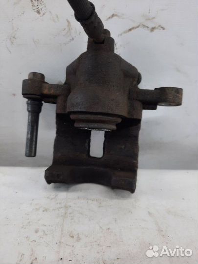 Суппорт тормозной задний левый Kia Rio хэтчбэк 5