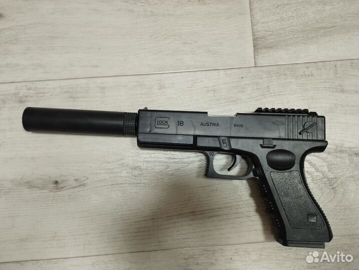 Игрушечное оружие Пистолет с вылетающими гильзами