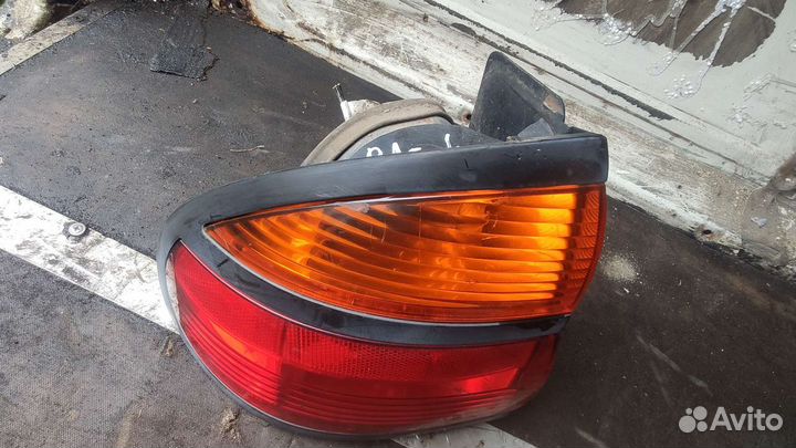 Фонарь левый Renault Laguna 1