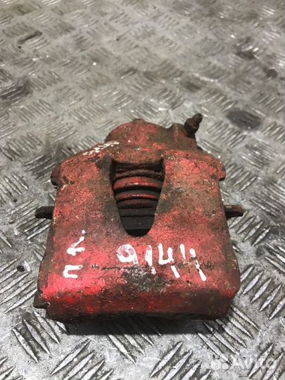 Суппорт тормозной передний левый Volkswagen Golf 4