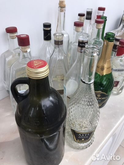 Бутылки стеклянные от коньяка и шампанского