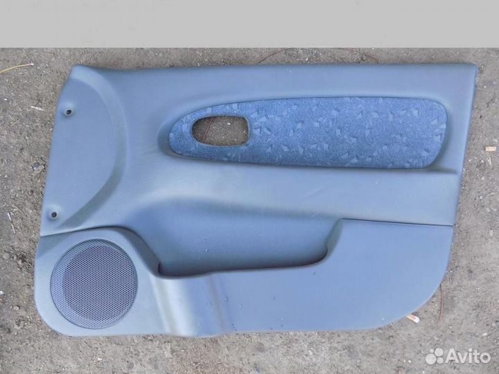 Обшивка двери передней правой Spectra 2001-2011