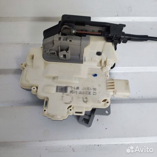 Замок двери передний левый Volkswagen Passat B 6