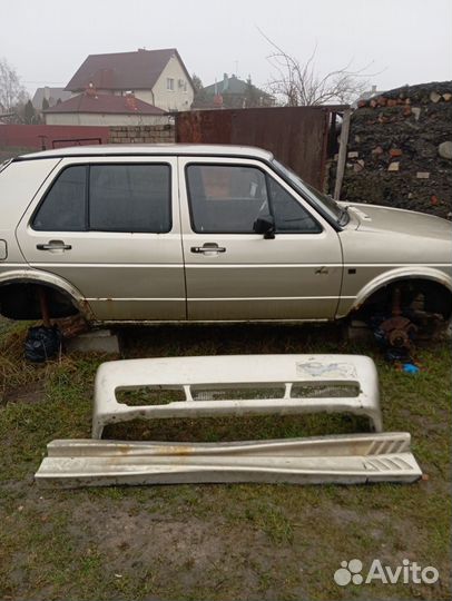 Задний бампер и накладки на пороги