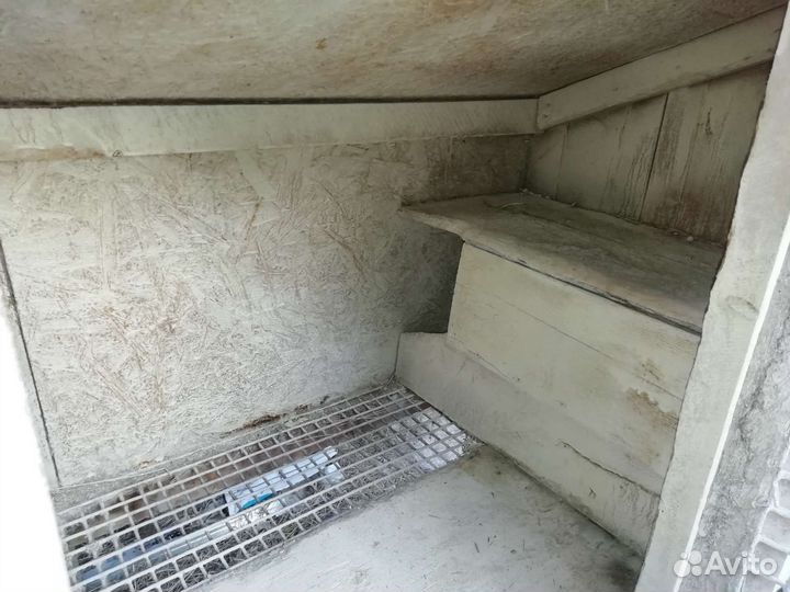 Клетка для кроликов с домиком для вывода