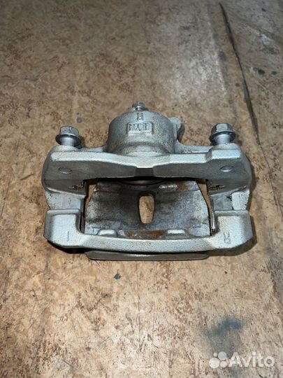 Суппорт тормозной Тойота Королла 150