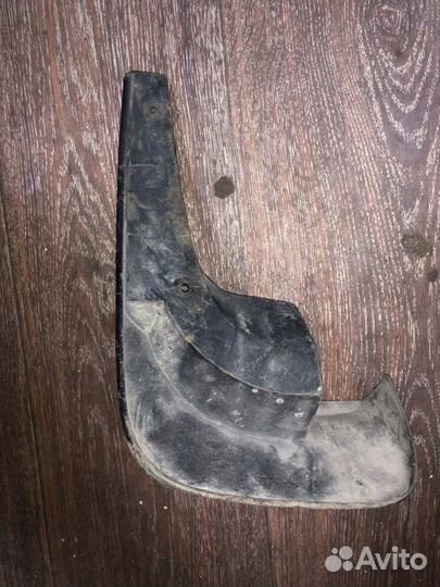 Брызговик задний правый Mazda Premacy CP19 FP