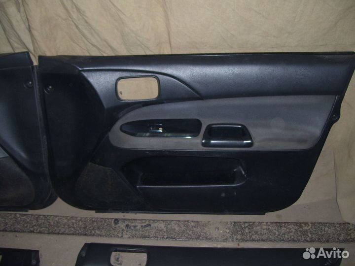 Митсубиси ланцер 9 обшивка двери