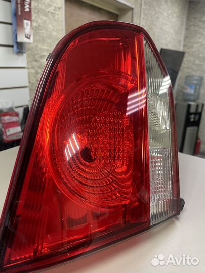Фонарь левый в крышку Фольксваген Гольф 6