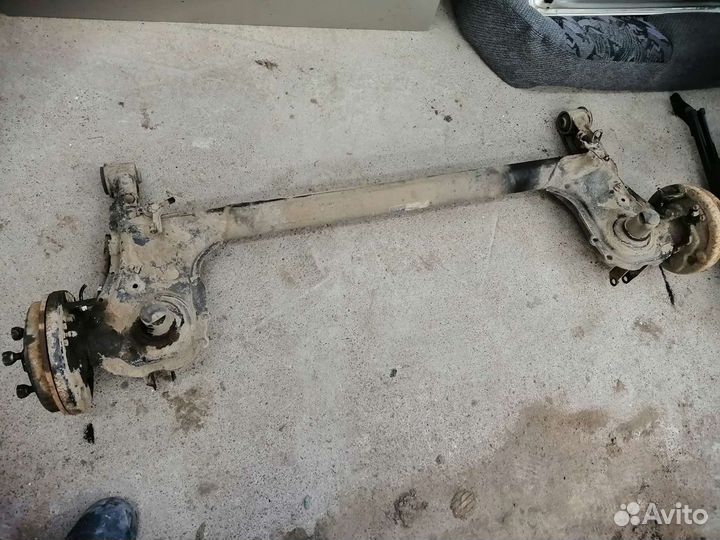 Toyota Duet задняя балка