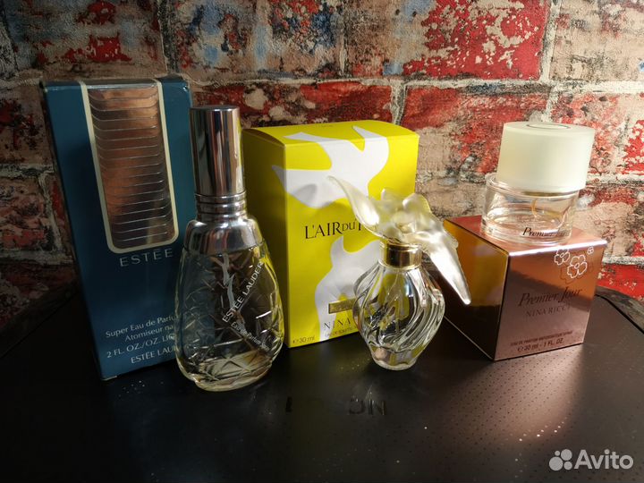 Пустые флаконы от духов Estee Lauder и Nina Ricci