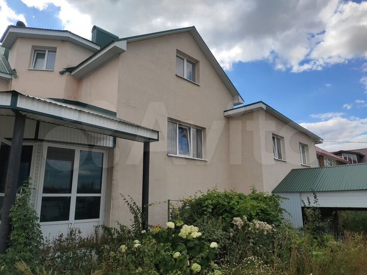 Коттедж 410 м² на участке 13 сот.