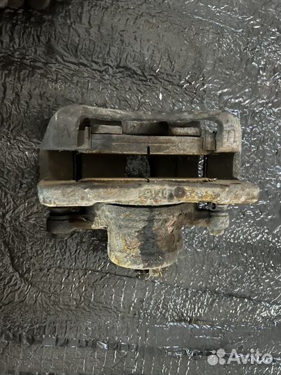 Тормозной суппорт передний Chevrolet Lacetti