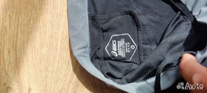 Тайтсы asics