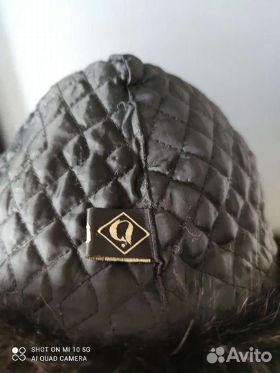 Зимняя шапка из кожи с мехом