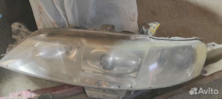 Фара ксенон левая opel vectra b