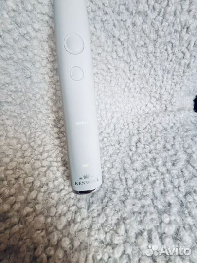 Электрическая зубная щетка