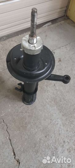 Стойка амортизатора передняя калина