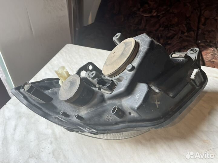 Фара левая Skoda Roomster