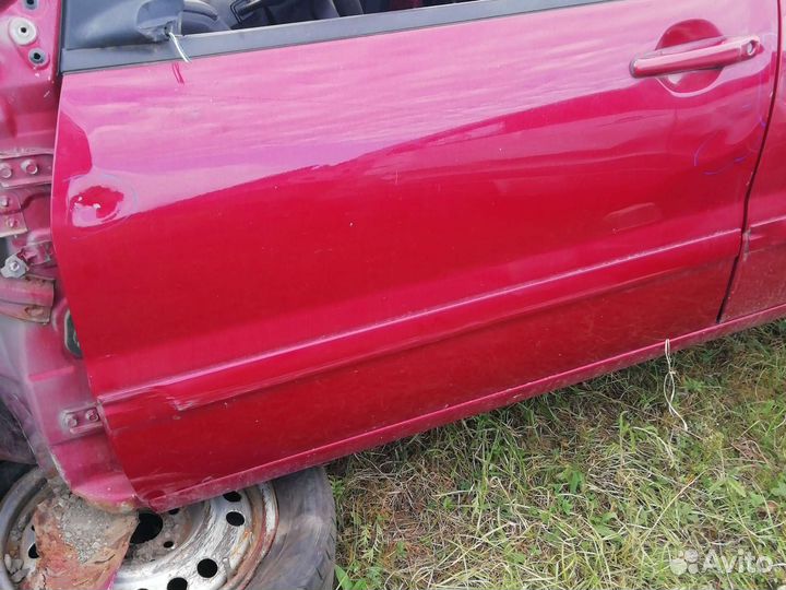 Дверь левая передняя лансер 9