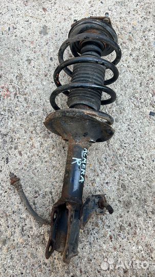 Стойка передняя Nissan Almera N16