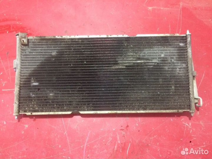 Радиатор кондиционера Nissan Almera N16 хэтчбек
