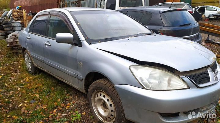 Блок упр. стеклоподъемника Mitsubishi Lancer 9