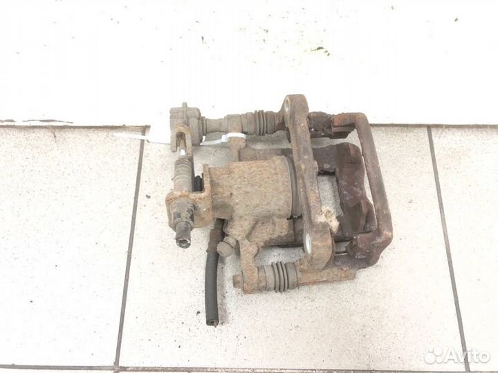 Суппорт тормозной задний правый Chevrolet Orlando