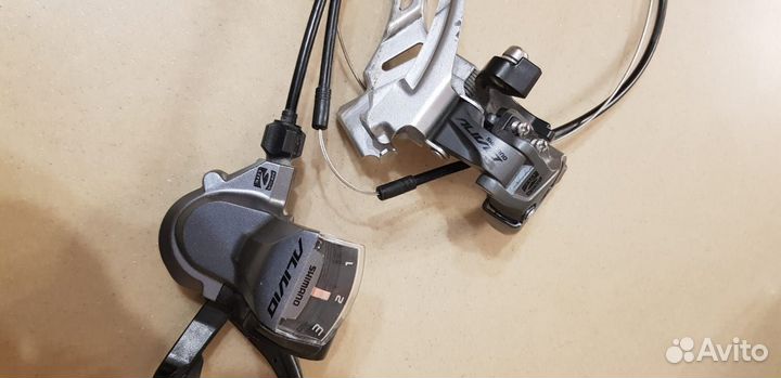 Переключатель и монетка Shimano olivio