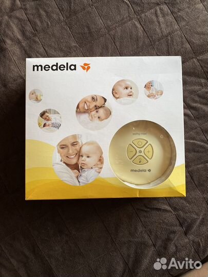 Молокоотсос medela электрический swing maxi