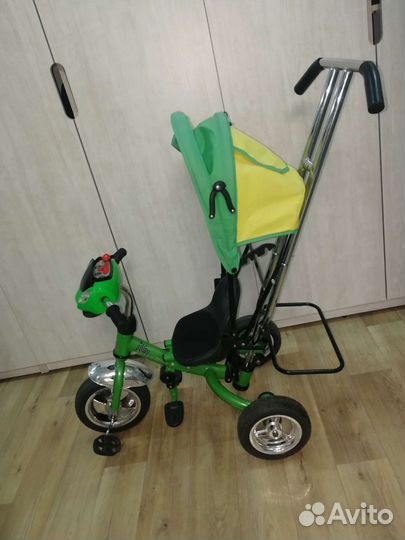 Детский велосипед с ручкой (музыкальный)