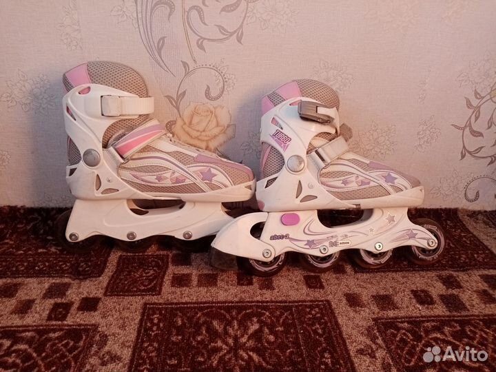 Роликовые коньки розовые б/у 34-38 размер