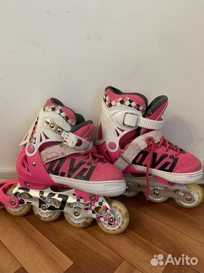 Роликовые коньки