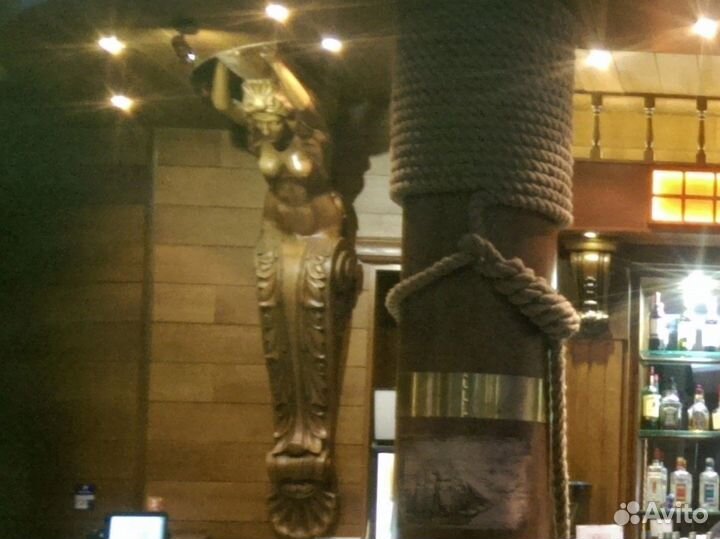 Резные фигуры русалок