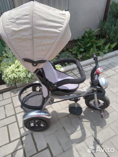 Велосипед-коляска с ручкой