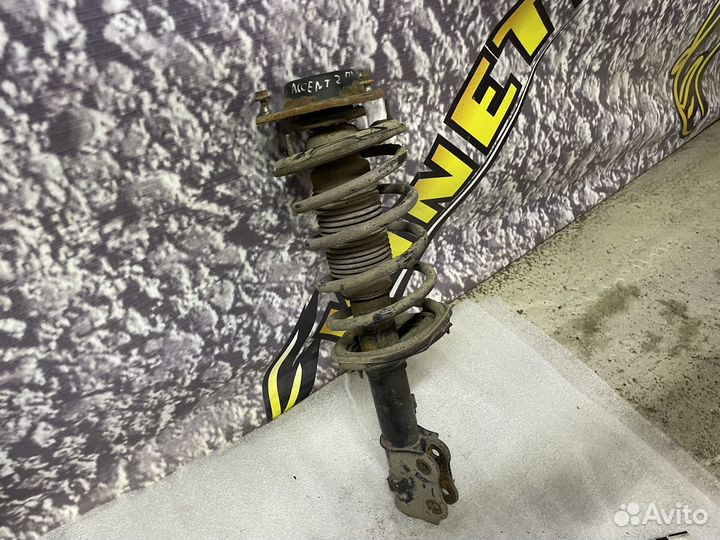 Амортизатор передний левый Hyundai Accent Акцент