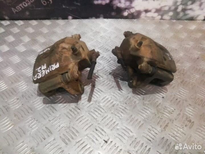 Тормозные суппорта переднее Nissan Primera P12 1.6