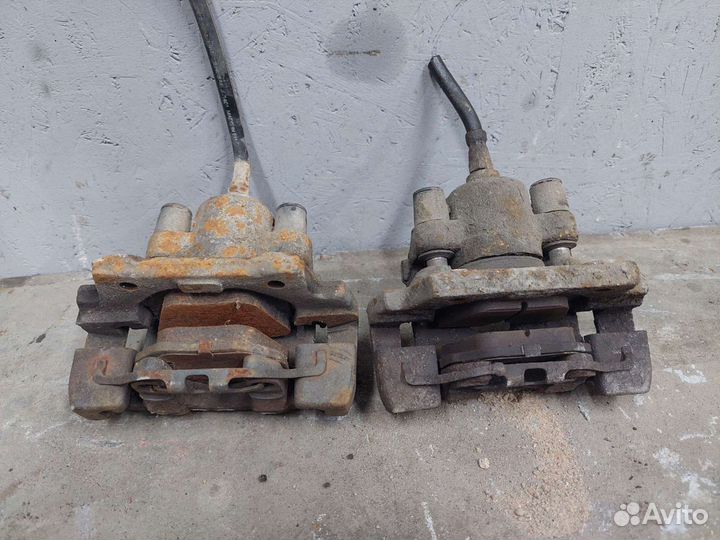 Супорт задний бмв е38