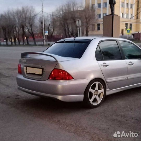 Юбка заднего бампера 2.0 Митцубиси Лансер 9