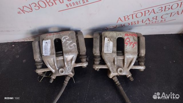 Суппорт передний правый Nissan Almera G15