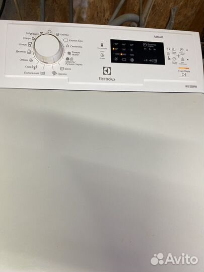 Стиральная машина с вертикальной загрузкой