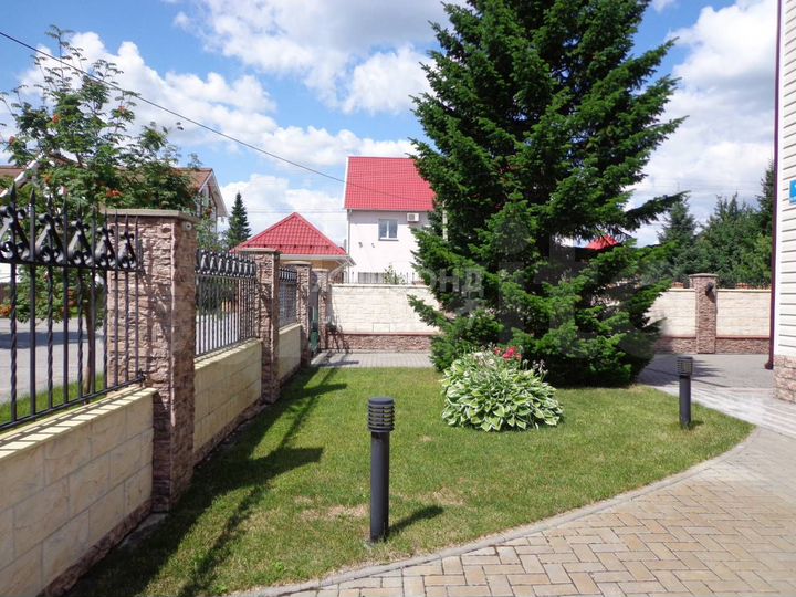 Коттедж 497 м² на участке 12 сот.