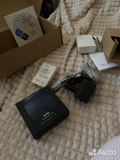 Двухдиапазонный adsl2+ модем zyxel P660RT2