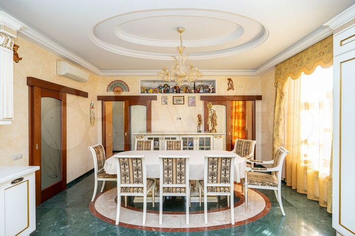 Коттедж 399,6 м² на участке 12,2 сот.