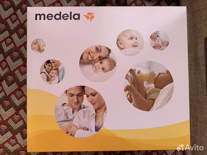 Молокоотсос medela mini электрический
