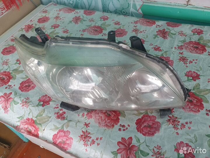 Фара передняя правая toyota corolla е150
