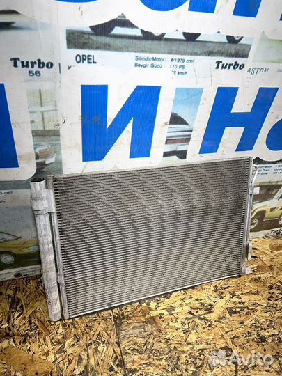 Радиатор кондиционера оригинал Киа Рио 3 Солярис