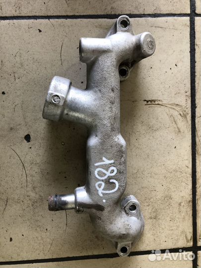 Фланец системы охлаждения Mitsubishi Montero Sport